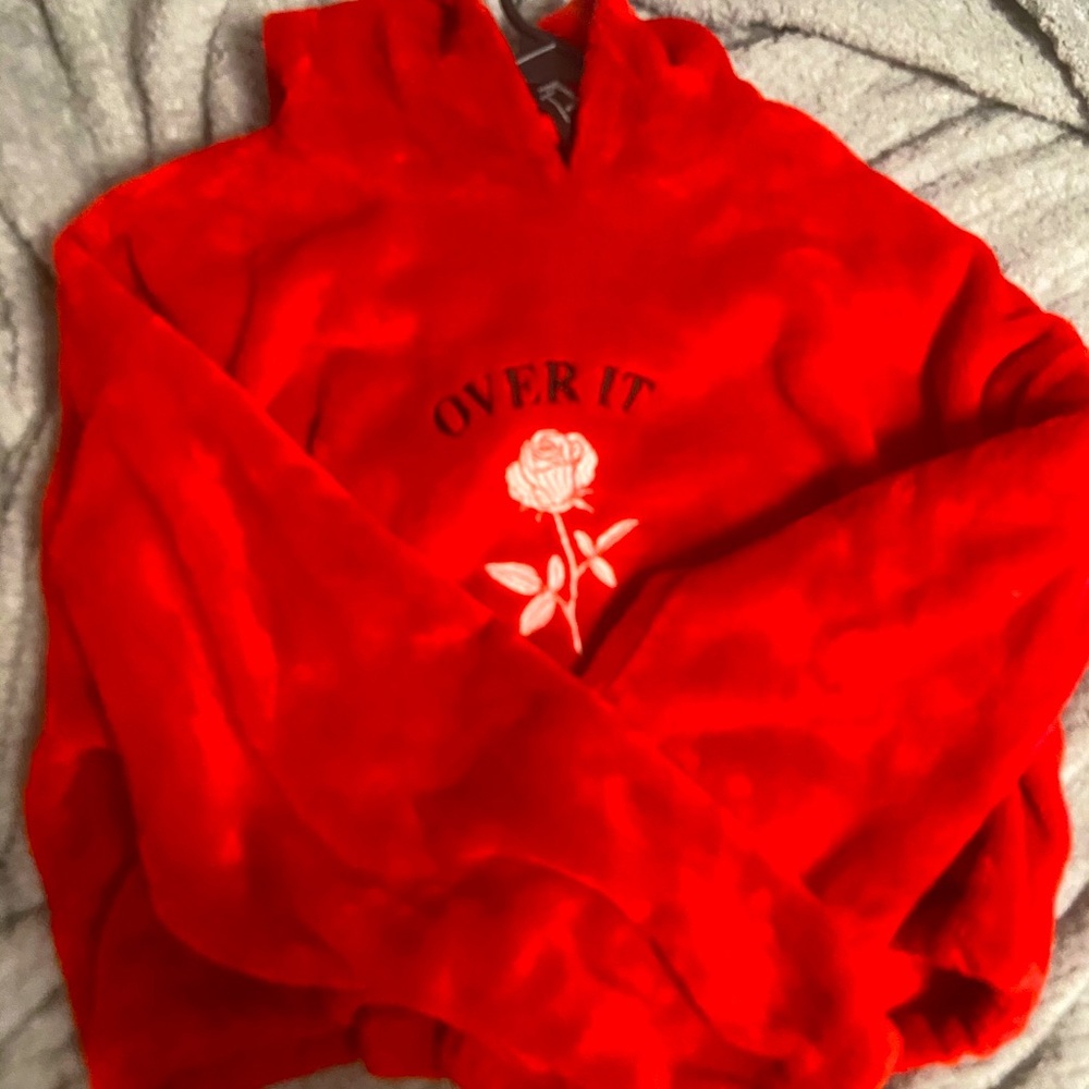 red VERY soft hoodie with “over it” printed!